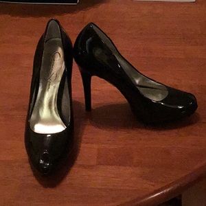 Black peep toe patent heels